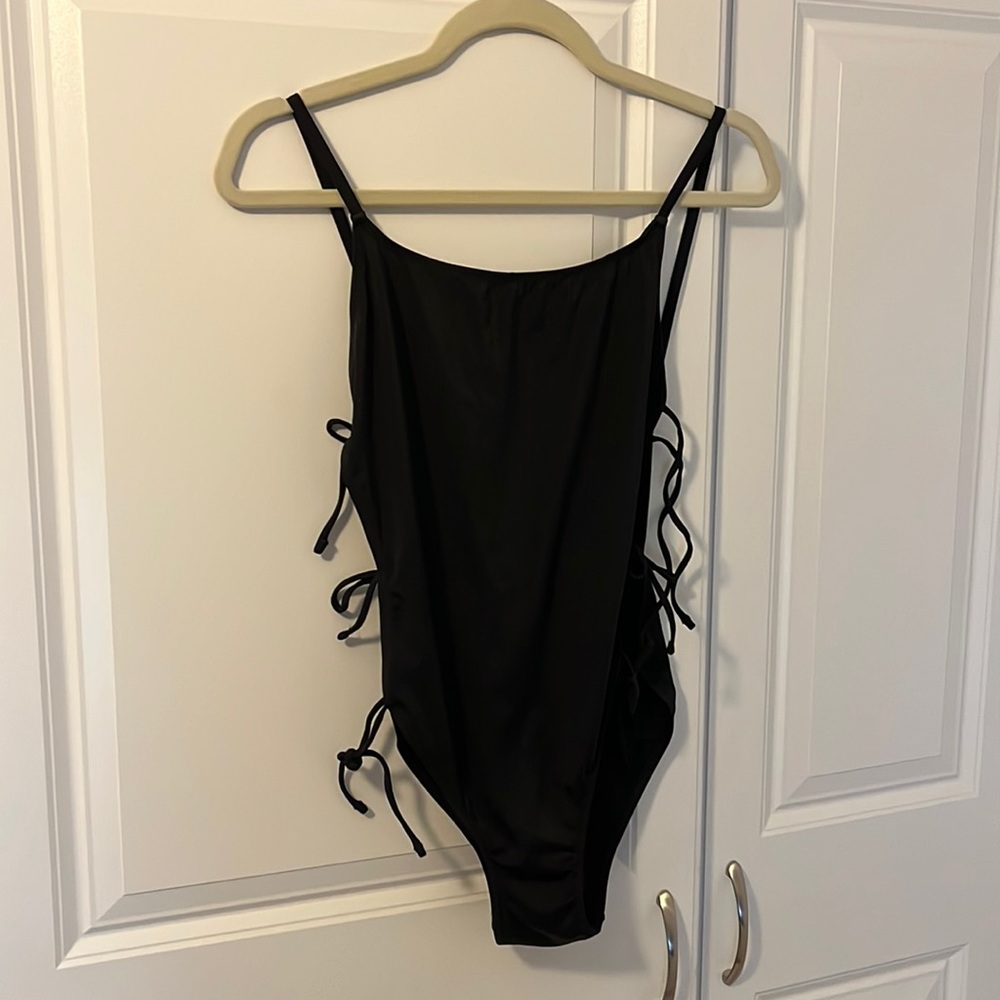 Black one piece side tie swimsuit